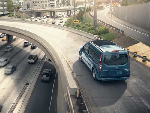 2023 Ford Transit Connect Passenger Wagon view of wagon driving down ramp on interstate