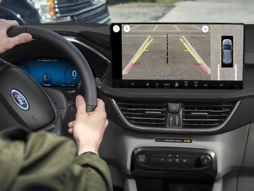 2024 Ford Escape view of touchscreen showing rear camera as car backs up into parking space